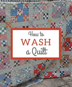 a quilt with the words how to wash a quilt on it