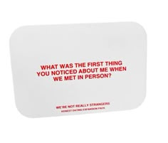 a white coaster with red lettering that says, what was the first thing you noticed about me when we met in person?