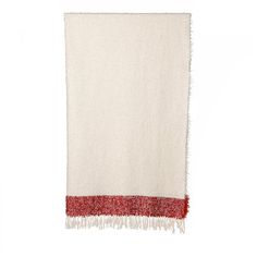 a white and red towel with fringes on the bottom, hanging from a wall