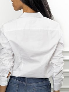 The perfect fitting boyfriend shirt. Slightly oversized but perfectly on trend. Wear it with the sleeves scrunched up, unbuttoned low and tucked in. We love this 90's-inspired look, updated for this century with our No Gape® button technology.The Shirt reimagined for the perfect fit – powered by No Gape® button technology. Bye bye blouse gape, Hello The Shirt. Patented and designed by Rochelle Behrens to eliminate blouse gape. 75% Cotton, 20% Nylon, 5% Spandex Made in Portugal Powered by No Gape The Boyfriend, Boyfriend Shirt, 90s Inspired, Women Artisans, The Shirt, Bye Bye, Ruffle Blouse, Perfect Fit, Sleeve Length