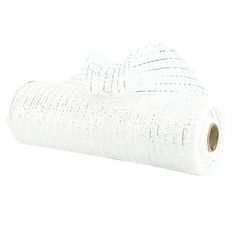 a roll of white fabric sitting on top of a table