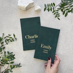 two personalized green wedding guest book with gold lettering