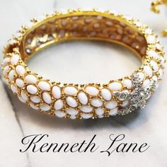 We Present One Of His Most Exquisite Pieces With Detailed Prongs Forming Glimpses Of Glittering Gold Against Pure White Lacquer Cabochons And Finished Off, Like A Piece Of Art, With A Bright, Dazzling Pave Crystals Encrusted In Silver Starfish. This Piece Is Signed Kjl, Measures 7"L X 7/8"W, Weighs 2.1 Oz. And Has A Spring Hinge Clasp. This Piece Is In Excellent Vintage Condition And Would Make A Beautiful Gift For Collectors. #Hamptonjewelry #Kennethlane These Bracelets Are Sold Individually In White Bangle With 17 Jewels, Luxury White Rhinestone Jewelry, White Rhinestone Jewelry, White Bangle With Sparkling Stones, White Sparkling Stones Bangle, Formal White Jeweled Jewelry, White Jeweled Bangle, Elephant Bangle, Amber Bead Necklace