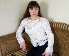 "Also you can find other Crochet blouses here: https://www.etsy.com/shop/NataliStudioUA?ref=seller-platform-mcnav&section_id=22291529 Hand made. Crochet white summer blouse. Crocheted blouse crocheted from beautiful and very delicate motifs. Motifs are connected to each other in the process of knitting according to the scheme. This interesting and openwork blouse model will be a great addition or even a highlight in the wardrobe. Blouse length - 56 cm/22\" size: M (height of model 165 - 170 Stretch Casual Long Sleeve Lace Top, Casual Long Sleeve Stretch Lace Top, Stretch Long Sleeve Lace Top For Summer, Elegant Long Sleeve Stretch Crochet Top, White Crochet Blouse For Summer, Casual White Crochet Lace Blouse, Summer Crochet Fitted Blouse, Fitted Crochet Blouse For Summer, Fitted Crochet Blouse