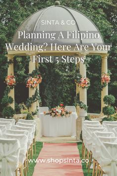 an outdoor wedding set up with chairs and tables