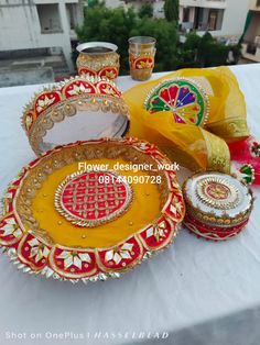 an assortment of decorative items on a table