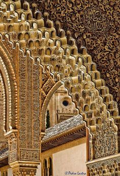 an intricately designed wall and ceiling in a building