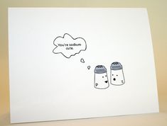 a greeting card with an illustration of two mittens and a thought bubble on it