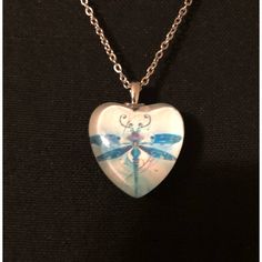 This Beautiful Glass Pendant Necklace Features A Beautifully Colored Dragonfly In Blues & Purples! The Back Is Inscribed With: “I Love You Today, Tomorrow, Always”. A Beautiful Token Of Love That Would Make A Lovely Gift For A Special Person In Your Life. Cute Blue Necklace For Gift, Fun Blue Necklace For Gift, Cute Butterfly Necklace For Gift, Whimsical Blue Necklace For Gifts, Whimsical Blue Necklace For Gift, Fun Blue Handmade Necklaces, Fun Clear Jewelry As Gift, Fun Clear Jewelry As A Gift, Fun Clear Jewelry For Gifts