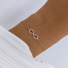 Gold Cubic Zirconia Infinity Bracelet, Luxury Silver Infinity Bracelets, Adjustable Silver Infinity Chain Bracelet, Sterling Silver Infinity Bracelet With Adjustable Chain, Gold-tone Cubic Zirconia Bracelets For Gifts