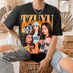 "Twice Tzuyu Bootleg T-shirt - Twice Shirt - Kpop Shirt - Kpop Merch - Twice Clothing - Kpop Gift for he and him - Rap Hip hop Tee This is our unisex shirt, and it's true to size. To get the oversized look, you have to choose +1 or +2 of your original size number. If you're not sure about your size, you can refer to our size chart. Reach out if you have any issues with your order! The unisex heavy cotton tee is the basic staple of any wardrobe. It is the foundation upon which casual fashion grows. The specially spun fibers provide a smooth surface for premium printing vividity and sharpness. No side seams mean there are no itchy interruptions under the arms. The shoulders have tape for improved durability. .: 100% cotton (fiber content may vary for different colors) .: Medium fabric (5.3 o Kpop Graphic Print T-shirt For Summer, Black Kpop Crew Neck T-shirt, Kpop Crew Neck T-shirt For Streetwear, Y2k Black Custom Print T-shirt, Black Y2k Custom Print T-shirt, Y2k Style Black T-shirt With Custom Print, Kpop T-shirt With Text Print And Short Sleeves, Kpop Short Sleeve T-shirt With Text Print, Kpop Style Summer Top With Screen Print