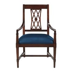 a wooden chair with blue upholstered seat and armrests on an isolated white background