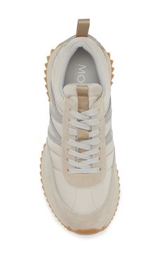 A monogram M races across the sidewall of a retro leather sneaker set on a sporty sawtooth sole. Lace-up style Leather upper/synthetic and textile lining/synthetic sole Imported Designer Shoes Leather Chunky Sneakers With Rubber Waffle Outsoles, Casual Leather Chunky Sneakers With Rubber Waffle Outsoles, Modern Studded Sneakers For Jogging, Leather Sneakers For Jogging, Leather Chunky Sneakers With Studded Outsoles, Sporty Leather Sneakers With Rubber Waffle Outsoles, Leather Chunky Sneakers With Rubber Sole For Jogging, Leather Chunky Sneakers With Round Toe For Casual Wear, Leather Sneakers With Vibram Sole For Jogging