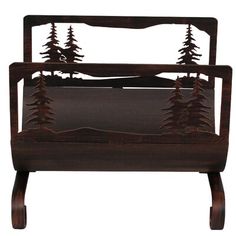 a wooden bed with pine trees on it