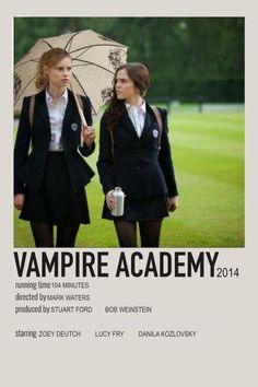 two women in school uniforms holding umbrellas on the cover of magazine vampire academy 2014