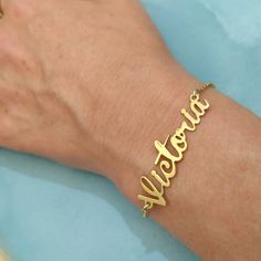 Personalized 14k - Name Bracelet - Solid Gold Bracelet - Custom Name Bracelet - Name Jewelry - Christmas Gift - Personalized Gift - Victoria . . . . . . . . . . . . . . . . . . . . . . . . . . . . . . . . . . . . . . . . . . . . . . . . . . . . . . . . . . . Looking for a thoughtful gift for your loved one? You will love this high quality Personalized 14k Name Bracelet. This is a perfect gift for your girlfriend or wife. This lovely Personalized 14k Solid Gold Name Bracelet is made to order. Pur Gold Charm Bracelet Gift, 14k Gold Name Bracelet Jewelry, Customizable 14k Gold Bracelet Jewelry, Customizable 14k Gold Bracelet, Custom Name 14k Gold Bracelets For Gift, Customized Gold Name Bracelet, Custom Name Bracelet Jewelry For Valentine's Day, Elegant Customized 14k Gold Name Bracelet, Elegant Customized Gold Bracelet