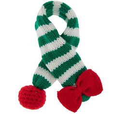 Size: Extra Small/Small Dimensions: 17" x 2" Material: Fabric Color: Green, White & Red Pattern: Stripes Quantity: 1 Care: Machine Wash, Cold, Gentle Cycle Only Non-Chlorine Bleach When Needed Reshape Lay Flat To Dry Dress your dog for the season in this adorable Striped Knitted Dog Scarf! This cute scarf features a trendy cable knit look and a festive striped design. At one end is a tiny knit bow, and at the other end is a matching knit ball. On the back of the scarf is a fabric loop you can push the ball end through, allowing the scarf to easily hold around your pup's neck. Use this scarf to delight your guests with a well dressed pet this holiday season! Knitted Dog, Cute Scarf, Knit Bow, Green White Red, Cute Scarfs, Dog Scarf, Dog Scarfs, Red Pattern, Crochet Scarves