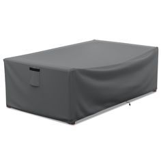 an outdoor furniture cover on top of a table