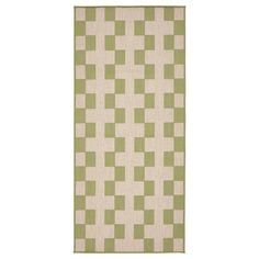 a green and white rug with squares on it