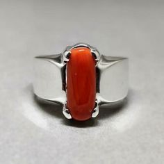 "Red Coral /Moonga 4.00-11.00 Ct. Stone 92.5 Sterling Silver Ring For Men & Women. This ring is suitable for Men & Women having ring sizes between 4.25 to 12.00 as per US ring standards. Size of this ring is easily by hand. Fine quality Red Coral is used to give best results for your astrological needs. Stone will be neat and clean without blemishes. Gemstone is left open from the back side. Gemstone certified by a Well reputed laboratory. This fashionable flat Rings band is dainty and e Untreated White Gold Jewelry For Formal Occasions, Red Gemstone Jewelry With Rectangular Stone, Red Rectangular Gemstone Jewelry, Classic Jewelry With Large Oval Cabochon Stone, Classic Oval Cabochon Large Stone Jewelry, Modern Untreated Jewelry For Anniversary, Classic Large Stone Jewelry For Anniversary, Modern Hallmarked Red Rings, Red Sterling Silver Oval Cabochon Jewelry