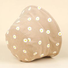 Introducing our delightful Summer Daisy Pattern Bucket Hat, the ultimate accessory for your little one's outdoor adventures! Crafted with the utmost care and attention to detail, this hat combines style, comfort, and sun protection to ensure your child stays safe and fashionable under the summer sun. Material: We've selected a premium blend of cotton and polyester for this hat, offering the perfect balance of softness, breathability, and durability. The cotton ensures comfort, while the polyeste Beige Hat For Outdoor Spring Activities, Beige Spring Outdoor Hat, Spring Outdoor Brown Bucket Hat, Spring Outdoor Beige Hat, Cute Outdoor Hats For Spring, Cute Summer Sun Hat For Outdoor, Cute Adjustable Beige Sun Hat, Playful Adjustable Cream Hat, Cute Outdoor Spring Hats