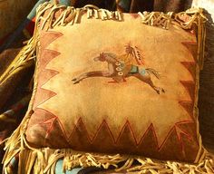 a decorative pillow with a horse on it