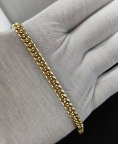 "6.2mm All Shiny Mens Miami Cuban Bracelet Box Clasp Lock Real 14K Yellow Gold * Metal : Real 14K Yellow Gold, (Properly Stamped, 14K) * Condition : Brand New * Finish : Polished * Weight : Apox 9.6 gram * Length : 8 inches * Width : 6.2mm * Clasp/Bail : Box Clasp Lock These Chains are 100% Authentic 10K Gold \"Not Plated or Filled\" This is a Beautiful Genuine Real 10K Solid Gold Miami Cuban Chain and Will look Great on Men & Women. Bosphorusgold" 14k Gold Cuban Link Chain Bracelet, 14k Yellow Gold Cuban Link Chain Bracelet, 14k Gold Cuban Link Bracelet With Curb Chain, Formal Cuban Link Gold Bracelet, Gold Arm Band, Cuban Bracelet, Bracelet Box, Gold Armband, Miami Cuban