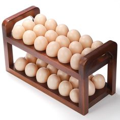 a wooden rack filled with lots of eggs