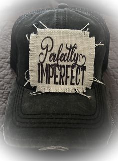 Perfectly Imperfect  Low profile cap Distressed 60% cotton, 40% polyester  Velcro adjustable back Pre curved visor  Mesh back One size fits most, but it is a firm fitting Adjustable Distressed Baseball Cap With Curved Visor, Distressed Cotton Trucker Hat, Adjustable Distressed Trucker Hat Baseball Cap, Black Distressed Dad Hat Baseball Cap, Distressed Black Dad Hat Baseball Cap, Adjustable Distressed Trucker Baseball Cap, Black Distressed Dad Hat One Size, Black Distressed Dad Hat, Adjustable Distressed Black Baseball Cap