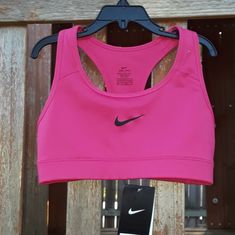 Nike Dri-Fit Sports Bra. Level: Medium Support Size: X-Small Condition: New With Tags Nike Stretch Sports Bra For Running, Nike Stretch Sports Bra For Workout, Fitted Sporty Sports Bra, Pink Sports Bra For Running, Athletic Fit, Nike Compression Activewear For Sports, Pink Athletic Fit Sports Bra For Running, Nike Stretch Sports Bra, Nike Sports Activewear, Pink Snug Fit Activewear For Sports