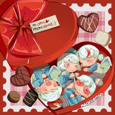 a heart shaped box filled with lots of chocolates next to a red bow and some candies