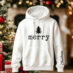 Welcome to CREARTTI Store =) Merry Christmas Trees Sweatshirt, Women's Holiday Hoodie & Unisex Shirt | Festive Christmas Apparel for the Season, Christmas family hoodie. Minimalist and unique design. HIGHLIGHTS * Each T-Shirt is custom made to order * Highest quality 100% Cotton, with an elegant finish. * All images are fused directly onto the T-Shirt, no cracking, peeling or fading * Designed in and shipped from the U.S. HOW TO ORDER  Christmas Tree Hoodie  * Select the type of apparel you want Winter Cotton Hoodie Gift, Winter Cotton Hoodie As Gift, Winter Hoodie In Cotton As Gift, Christmas Cotton Hoodie With Letter Print, Christmas Cotton Hoodie Top, Hoodie Minimalist, Christmas Tree Hoodie, Family Hoodie, Christmas Apparel