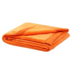 an orange towel folded on top of each other