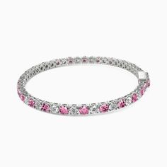 Indulge in the timeless beauty of this tennis bracelet. Meticulously crafted, this exquisite piece showcases a continuous line of lustrous round-cut gemstones, each meticulously set to create a seamless and elegant look. The brilliant sparkle of the gemstones adds a touch of glamour to any ensemble, making it a must-have accessory.Carat Weight: 6.5 ctStone Size: 3 mmStone Type: Moissanite/GemstoneNumber of Stones: 65 Stone Color: OptionalStone Shape: RoundWidth: 3.1 mmThickness: 3.1 mmMaterial: White Gold Tennis Bracelet With Sparkling Stones, Sparkling Stones Tennis Bangle Bracelet, Dazzling White Gold Tennis Bracelet With Sparkling Stones, Fine Jewelry Tennis Bracelet With Sparkling Stones For Anniversary, Anniversary Fine Jewelry Tennis Bracelet With Sparkling Stones, Anniversary Tennis Bracelet With Sparkling Stones, Fine Jewelry Bracelets With Sparkling Stones, Diamond Tennis Bracelet With Sparkling Stones, Classic White Gold Tennis Bracelet With Gemstone