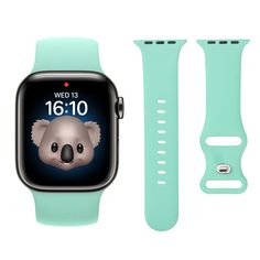 an apple watch with a koala face on the screen and a light green band