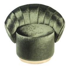 a green velvet chair with gold trimmings on the legs and back, sitting in front of a white background