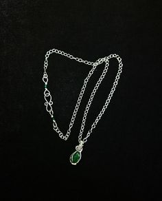 A sweet little moss agate wrapped in fine silver with a cute hand wired clasp garnished with green Swarovski crystals.  The sterling silver chain is 3.7mm oval cable chain. Wire Clasp, Moss Agate, Fine Silver, Cable Chain, Sterling Silber, Sterling Silver Chains, Handmade Silver, Charm Necklace, Silver Chain