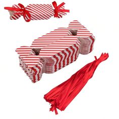 two red and white striped boxes with matching umbrellas