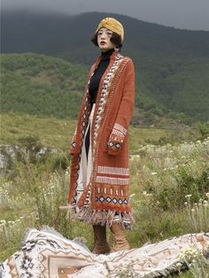 Bohemian fringed cardigan ethnic style mid-length sweater loose knitted coat

 


	
		
			Size/cm
			Bust
			Sleeves
			Length
		
		
			S
			100
			60
			96
		
		
			M
			104
			61
			98
		
		
			L
			116
			62
			102 Fringed Cardigan, Fringe Cardigan, Bohemian Women, Acrylic Fiber, Orange Pattern, Knitted Coat, Loose Knit, Loose Sweater, Ethnic Style