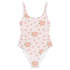 Our La Vie En Rose print, feminine and floral was designed to allow you to live your life in a beautiful pink rose garden inspired by the the Rodin Museum in Paris, France. This one-piece swimsuit for all figures will bring out your best features. Enjoy the smooth fabric and the flattering design, and show it off by the sea, pool or even worn as a body suit for elevated style !• 82% Polyester, 18% Spandex• Chlorine-resistant fabric• Cheeky fit with a scoop neckline and a low scoop back• Zig-zag Feminine Fitted Floral Print Swimwear, Fitted Floral Print Feminine Swimwear, Feminine Floral Print Swimwear, Fitted Pink Floral Print Bodysuit, Feminine Pink Floral Print Swimwear, Feminine Floral Print Swimwear For Swimming, Feminine Printed Swimwear For Spring, Pink Feminine Bodysuit For Summer, Feminine Pink Bodysuit For Summer