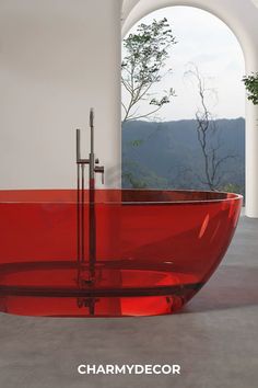 Red Oval Freestanding Bathtub in Scenic Bathroom