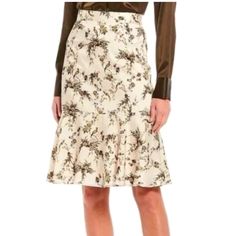 Antonio Melani Colton Floral Satin Skirt Features: Colton Floral Print Satin Skirt In Birch/Loden Cream Beige With Brown Floral Flower Bird Straight Pencil Skirt. Satin Trumpet Peplum Hem Lined. Back Zipper. 100% Polyester; Lining: 94% Polyester, 6% Elastane - Machine Wash/Dry Approx: Waist 28” Length 25” Feminine Beige Knee-length Skirt, Fitted Cream Cotton Skirt, Fitted Beige Tiered Skirt, Feminine Beige Skirt For Fall, Fitted Cream Midi Skirt, Cream Skirt For Spring Workwear, Knee-length Lined Cream Skirt, Chic Beige Floral Print Skirt, Beige Floral Print Midi Skirt