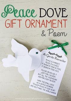 a peace dove gift ornament and poem on a white background with green ribbon