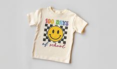 a t - shirt that says 100 days of school with a smiley face on it