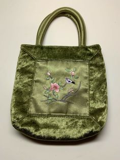 Vintage Fashion Express Evening Bag. Soft, velvety hand bag with delicate floral print pattern. Olive green color with attractive sheen. Velcro closure. Bag measures approx 7 3/4” wide x 8” tall. Measures approx 12 1/2” tall from top of handle to bottom of bag. Pre-owned, excellent condition. Vintage Green Satchel With Double Handle, Green Vintage Satchel With Double Handle, Vintage Green Double Handle Satchel, Vintage Green Shoulder Bag With Large Capacity, Vintage Green Shoulder Bag For Shopping, Green Vintage Shoulder Bag With Large Capacity, Vintage Green Rectangular Shoulder Bag, Vintage Green Satchel For Shopping, Vintage Green Bags With Double Handle