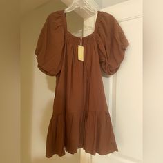 Flowy Dress With Puffy Sleeves. Brand New With Tags. Great Condition,No Stains Or Flaws. Brown Square Neck Dress For Date Night, Brown Square Neck Mini Dress For Brunch, Spring Mini Dress With Square Neck In Brown, Spring Brown Mini Dress With Square Neck, Brown Square Neck Mini Dress For Spring, Brown Short Sleeve Mini Dress For Daywear, Chic Brown Puff Sleeve Mini Dress, Brown Mini Dress With Short Sleeves For Daywear, Chic Brown Cotton Dress