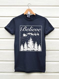 Believe Christmas Tshirt Christmas T-shirt Christmas Tees Tee Ideas, Believe Christmas, Christmas Tshirt, Christmas Outfits, Daily Style, Great T Shirts, Christmas T Shirt, Christmas Tees, Shirt Ideas