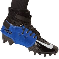 a pair of black and blue soccer cleats