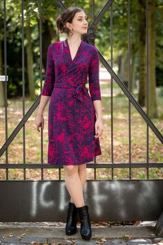 "Soft and flowing and very feminine: \"Diana\" has a flattering wrap style is tied with a ribbon at the waist to conjure a great silhouette. A small shawl collar neckline prevented to deep insight. Elegant stressed the wrap effect the waist, the neck stretches the upper body and you just feel great tightened. In the office as well as a festive occasion. With  3/4 sleeves. The dress is also great as a maternity dress or breastfeeding. The jersey fabric has a pattern in dark blue and bordeaux red. Blue Fitted Wrap Dress With Tie Waist, Red Fitted Wrap Dress With Tie Waist, Fitted Red Wrap Dress With Tie Waist, Elegant Red Wrap Dress With Surplice Neckline, Elegant Blue Faux Wrap Dress, Red Fitted Dress With Tie Waist, Fitted Red Dress With Tie Waist, Neck Stretches, Nursing Dress