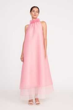 A maxi-length, tiered tent dress made out of organza. This style features a tiered ombre pattern, ruffle collar and hidden zipper closure at the back. Pink Patterned Dress, Pastel Dress Wedding Guest, Vegas Bomb, Color Palette Bridesmaids, Black Tie Optional Wedding Guest, Family Wedding Outfits, Pink Organza Dress, Brides Maid Dresses, Pink Bridesmaids